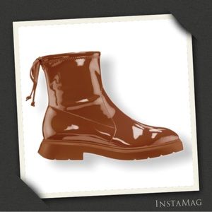 STUART WEITZMAN Benita Vinyl Lug Sole Booties